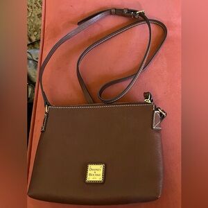 Brown Dooney and Burke shoulder bag. Never used. $50